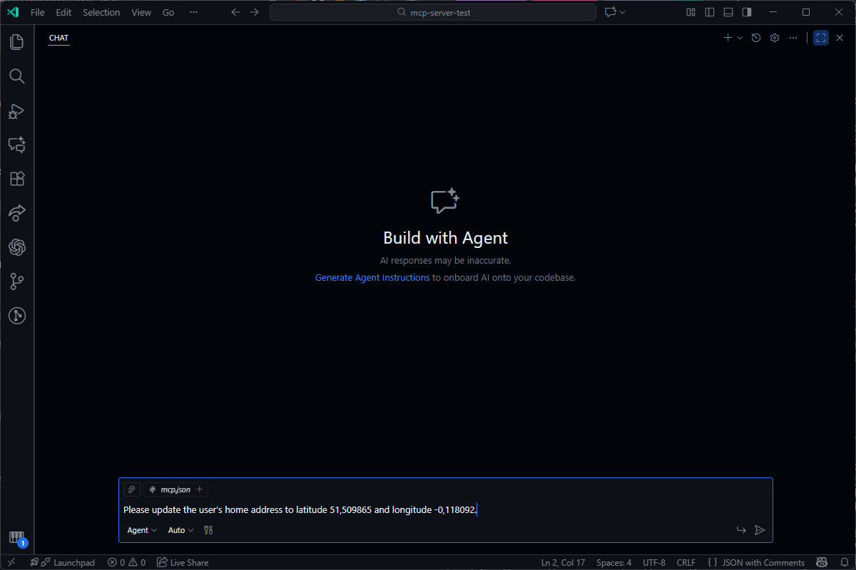 A code editor's AI chat agent, 'Build with Agent', prompted to update a user's address coordinates in a JSON file.